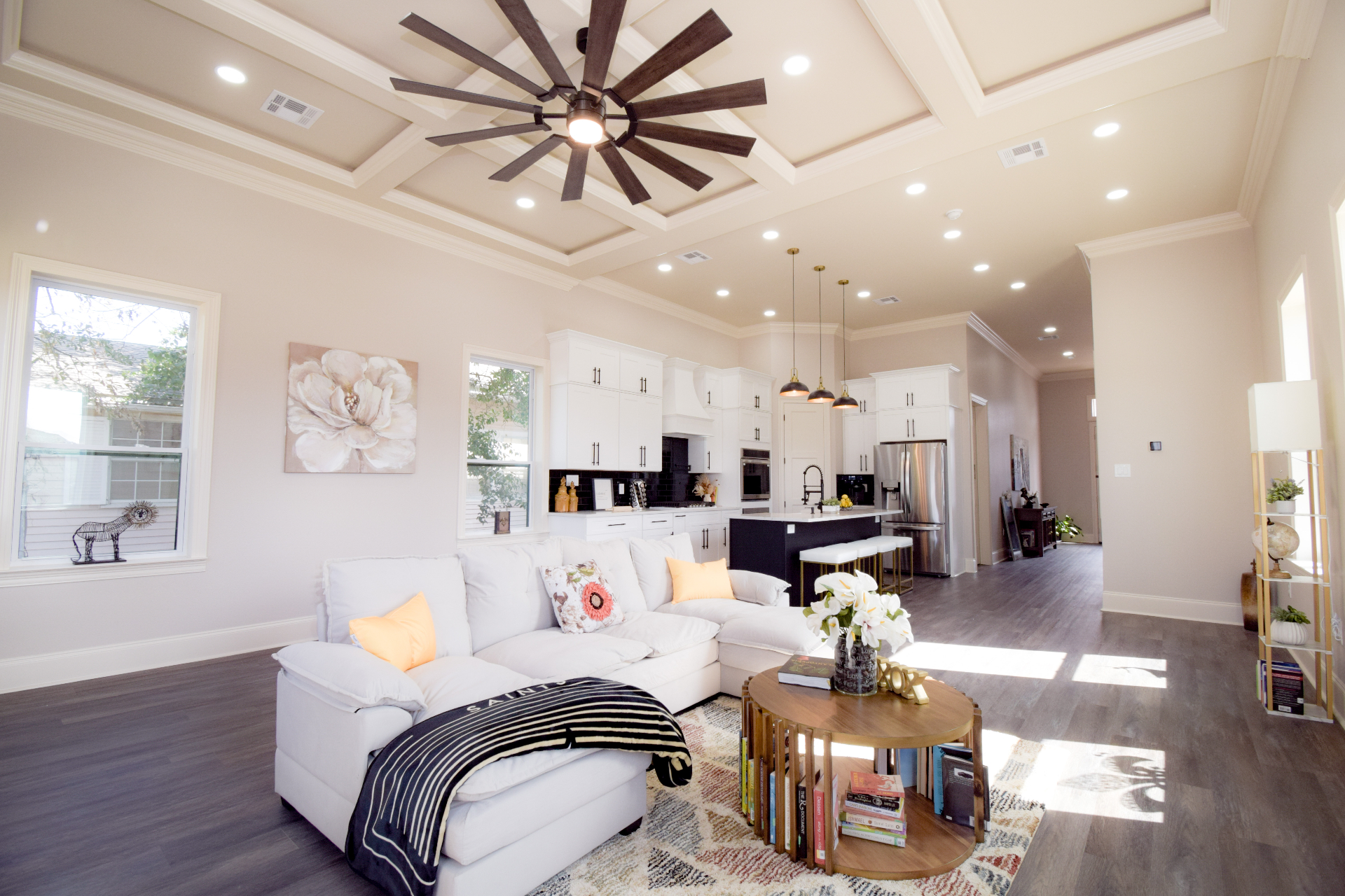 Open living and kitchen with coffered ceiling
